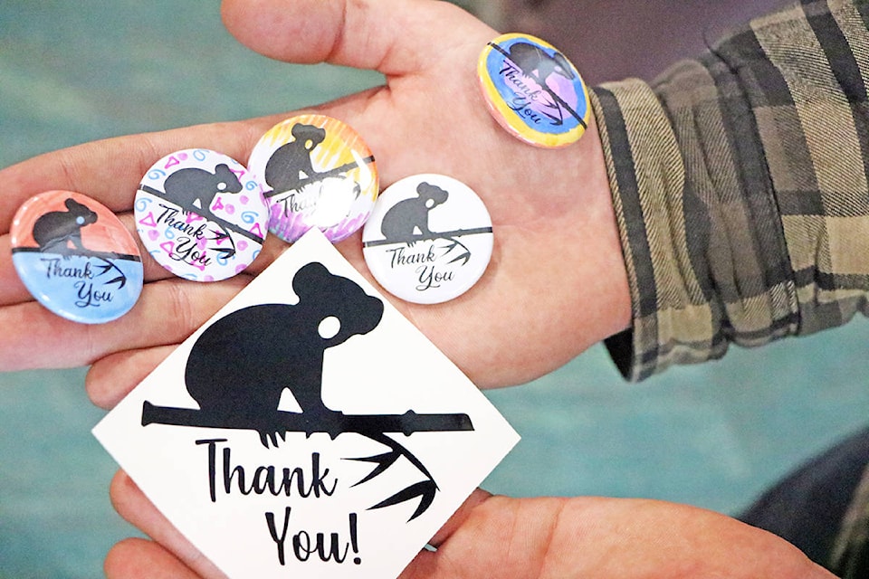 An example of the stickers and buttons being created for Dollars for Koalas. (Patrick Davies photo-Williams Lake Tribune)