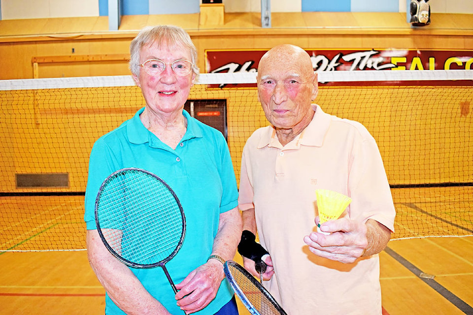 Williams Lake Badminton Club members Dot Chinner (left) and Clay Myers, who is the current president of the club, get ready for an evening of play Monday night at the Lake City secondary Columneetza gymnasium in Williams Lake. Chinner and Myers have been members of the club for close to 50 years. (Greg Sabatino photos - Williams Lake Tribune)