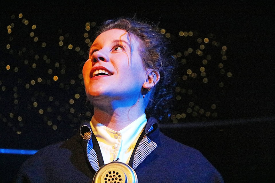 Tanis Armstrong as Henrietta Leavitt takes in the beauty of the night sky during the Williams Lake Studio Theatre’s production of Silent Sky. (Patrick Davies photo - Williams Lake Tribune)
