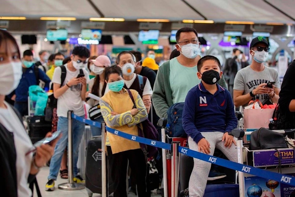 21022161_web1_200320-BPD-covid-airport-masks-CP-jan31.20_1