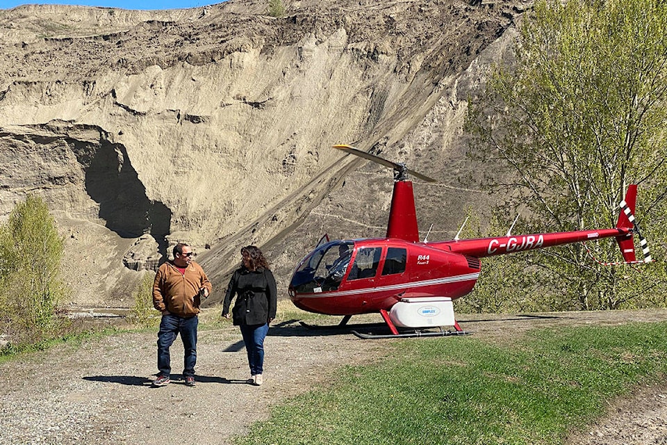 Xat’sull First Nation natural resource co-ordinator Mike Stinson and Chief Sheri Sellars took part in a helicopter tour of the Williams Creek river valley recently to see first hand the impact of recent flooding. (Photo submitted)