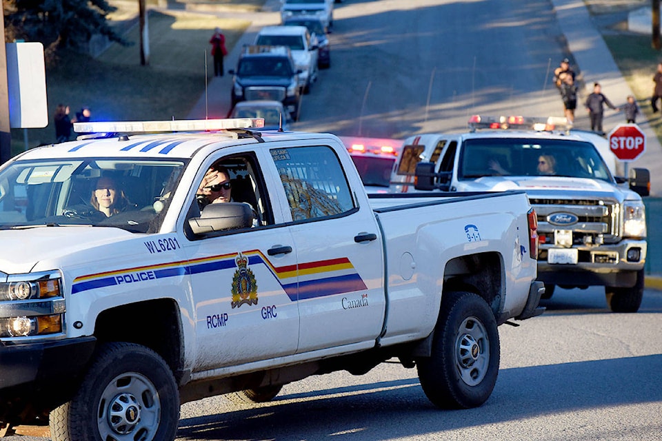 RCMP officers rallied to salute frontline healthcare workers in April as a show of appreciation for their efforts during the COVID-19 pandemic. (Angie Mindus photo - Williams Lake Tribune)