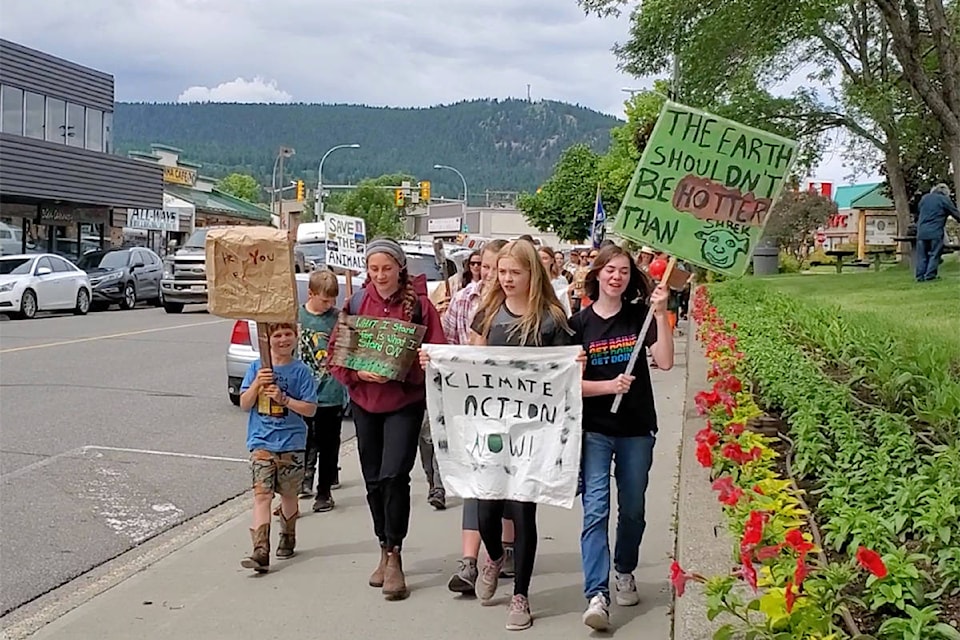 Williams Lake students Julia Zirnhelt, second from left, and Ella Kruss, second from right, organized a climate justice march Friday, June 26. (Monica Lamb-Yorski pho
