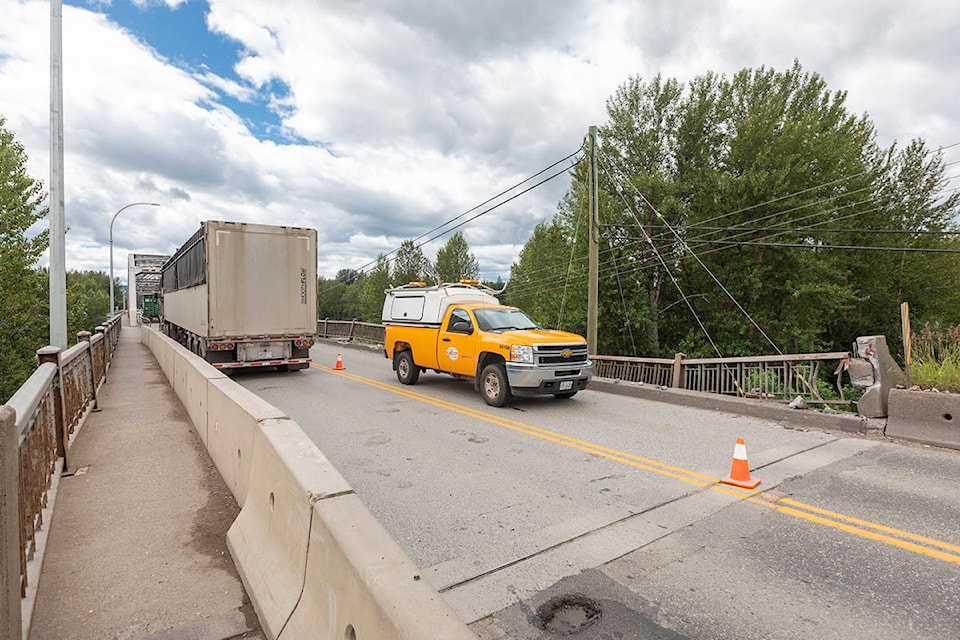 The Quesnel River Bridge is now reduced to single lane alternating traffic after a motor vehicle incident forced the bridge’s closure just before noon on Monday, July 13. (Sasha Sefter - Quesnel Cariboo Observer)