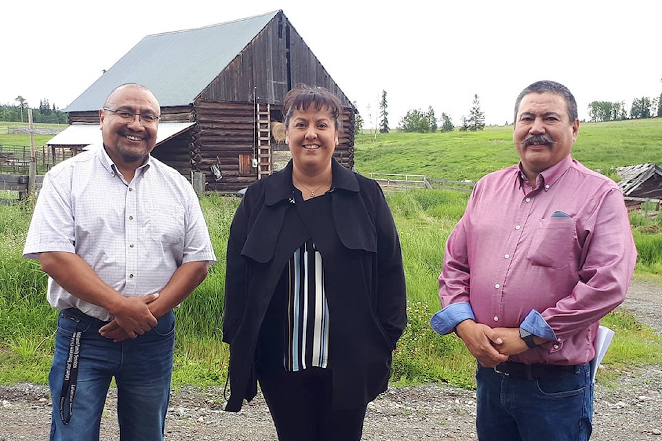 Northern Shuswap Tribal Council senior treaty manager Hank Adam (from left), Chief Sheri Sellars and Xat’sull First Nation treaty manager and negotiator Gord Keener were thrilled to celebrate the purchase of the former Carpenter Mountain Ranch on Friday, Aug 7. (Rebecca Dyok photo)