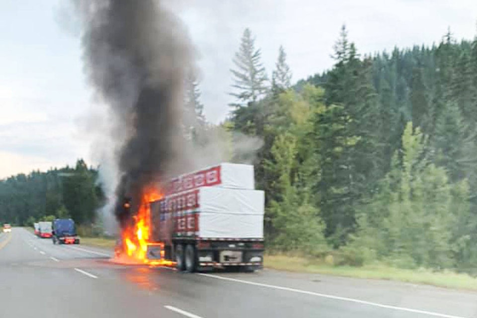 Highway 97 was closed for more than an hour north of Williams Lake Monday evening (Sept. 22) after a truck with a load of lumber caught fire. (Raymond Sellars Facebook photo)