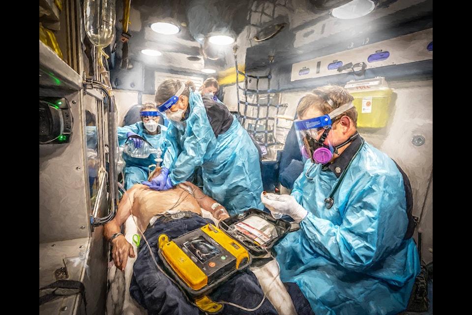 Titled “COVID TIMES,” Daniel Sandahl captured this image with the help of Williams Lake EMS, adding his thoughts, “Foggy glasses, sweating inside your gloves, hot plastic suits, increased risk of infection” to describe it on his Instagram post at Dansunphotoart.