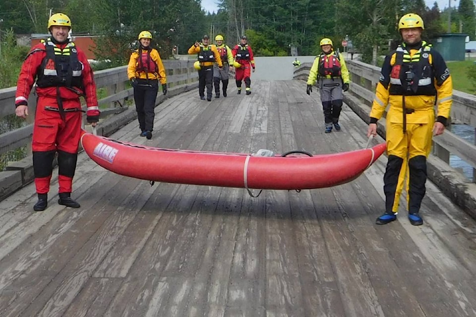 22743201_web1_Swift-Water---team-crossing-the-bridge-edit