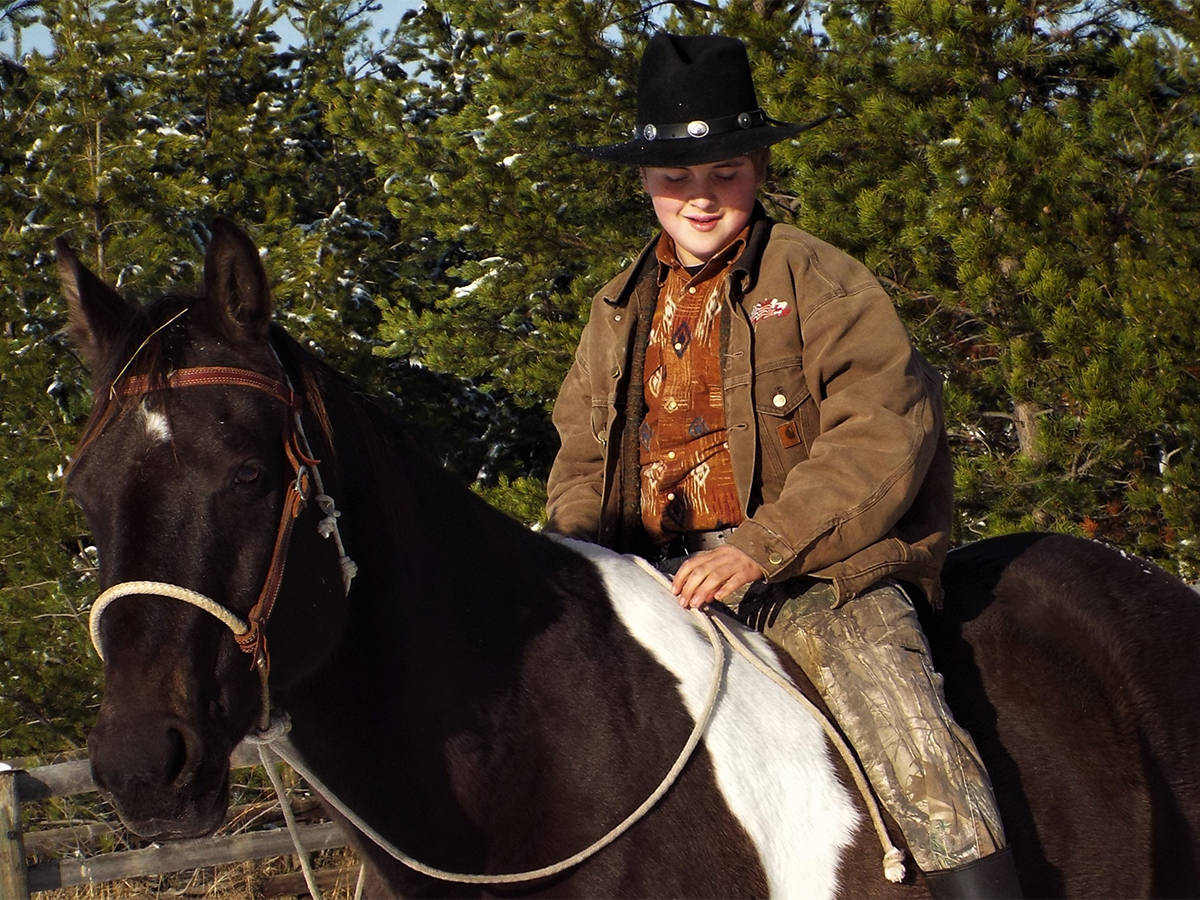 23525739_web1_201203-WLT-SeasonsGreetings-Horsin-Around_1
