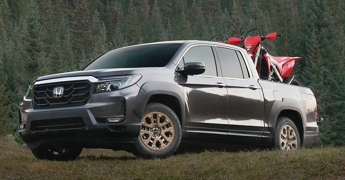 The revamped Honda Ridgeline has a much more aggressive front end, while these nifty bronze wheels are optional. PHOTO: HONDA