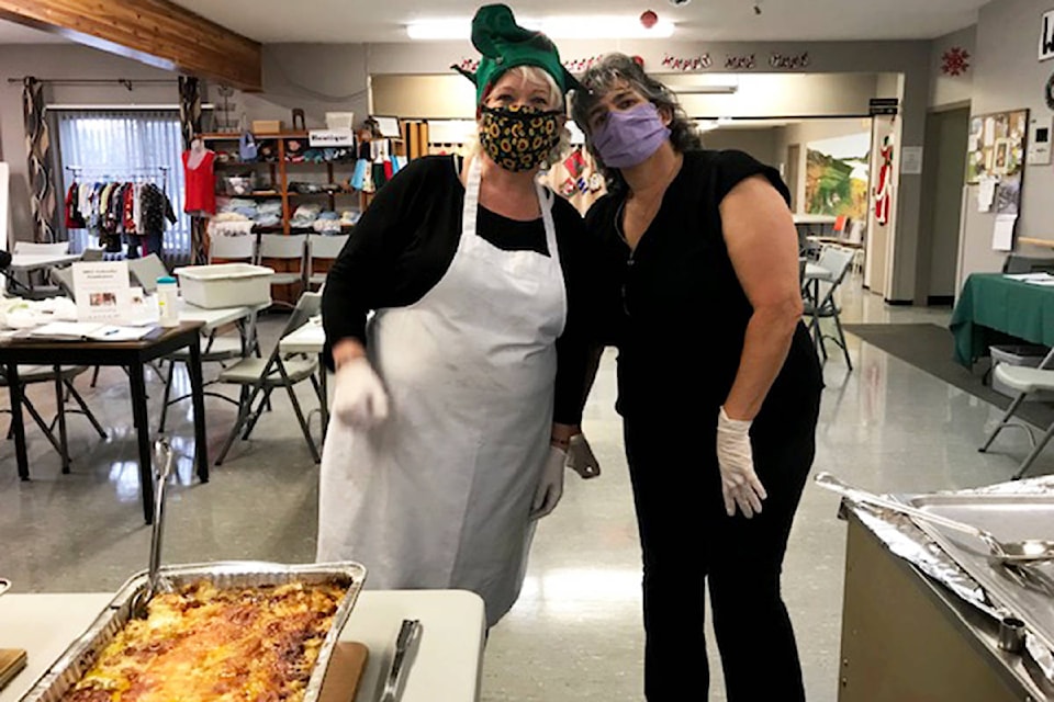 Volunteers were the heart and soul of the Christmas Dinner Out the Door Dec. 12. The event, put on by the Seniors Activity Centre and the Old Age Pensioners Organization, saw 200 meals served in a drive-thru style. (Photos submitted)