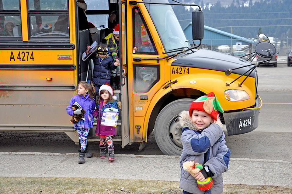 Cataline students Elsie Scott, Avaline Ostrom and Daxton Sauna-Czerniak drop off presents at the Child Development Centre in Williams Lake earlier this month. (Greg Sabatino photo - Efteen)