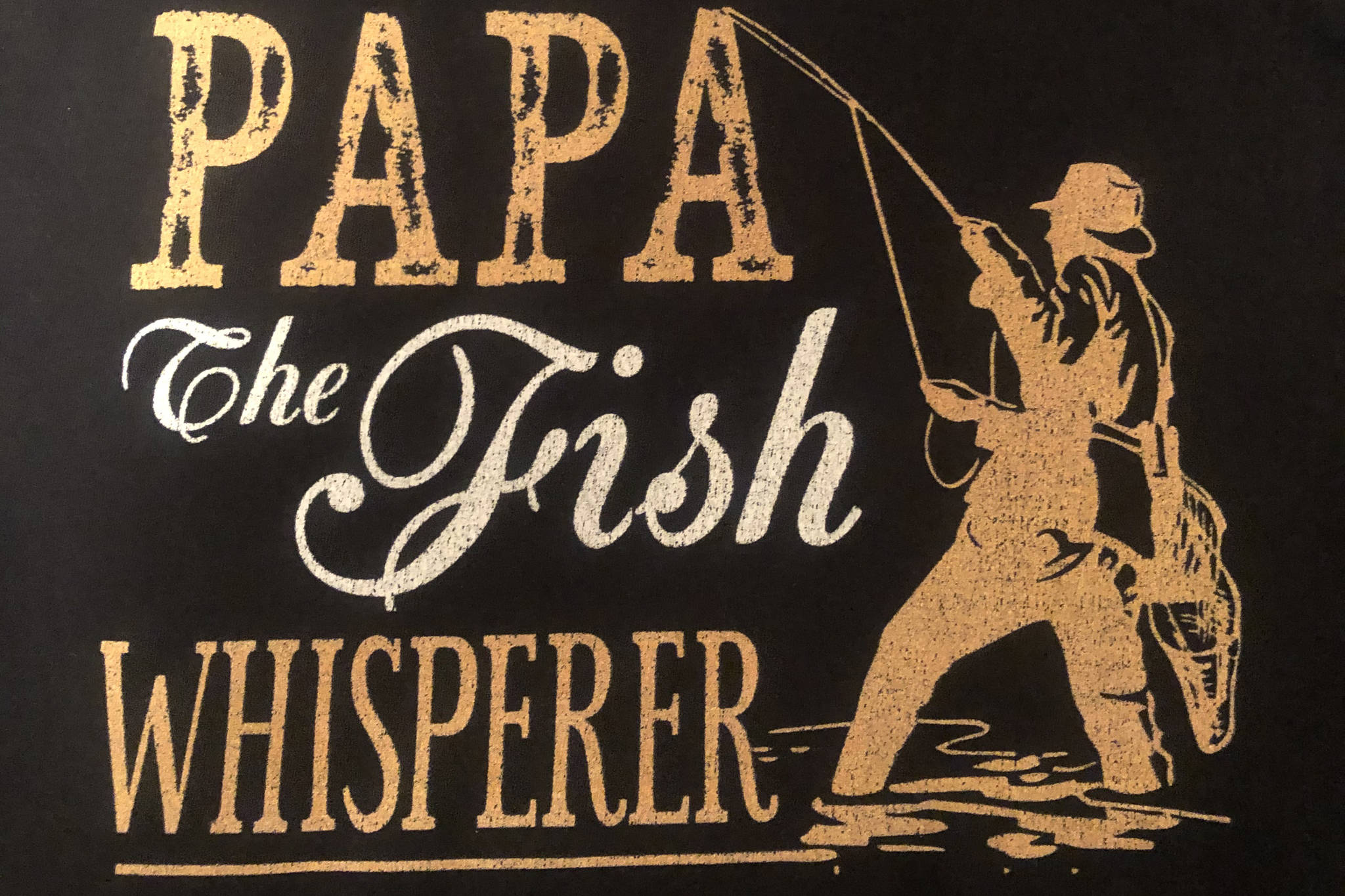 Murray Zelt credits his lucky t-shirt from his grandson Zayden for his ice-fishing success. (Photo submitted).