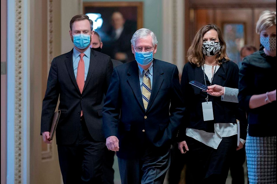 Senate Minority Leader Mitch McConnell, R-Ky., leaves the chamber after the Senate voted not guilty in the impeachment trial of former President Donald Trump on the charge of inciting the January 6 attack on the Congress by a mob of his supporters, at the Capitol in Washington, Saturday, Feb. 13, 2021. (AP Photo/J. Scott Applewhite)