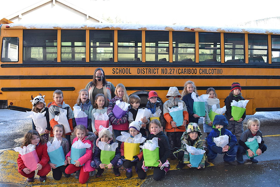 The Grade 2 class of 150 Mile House Elementary attended Cariboo Memorial Hospital with teacher Kirsty Bowers to deliver “kindness” bags full of small gifts to housekeeping staff. (Rebecca Dyok photo)
