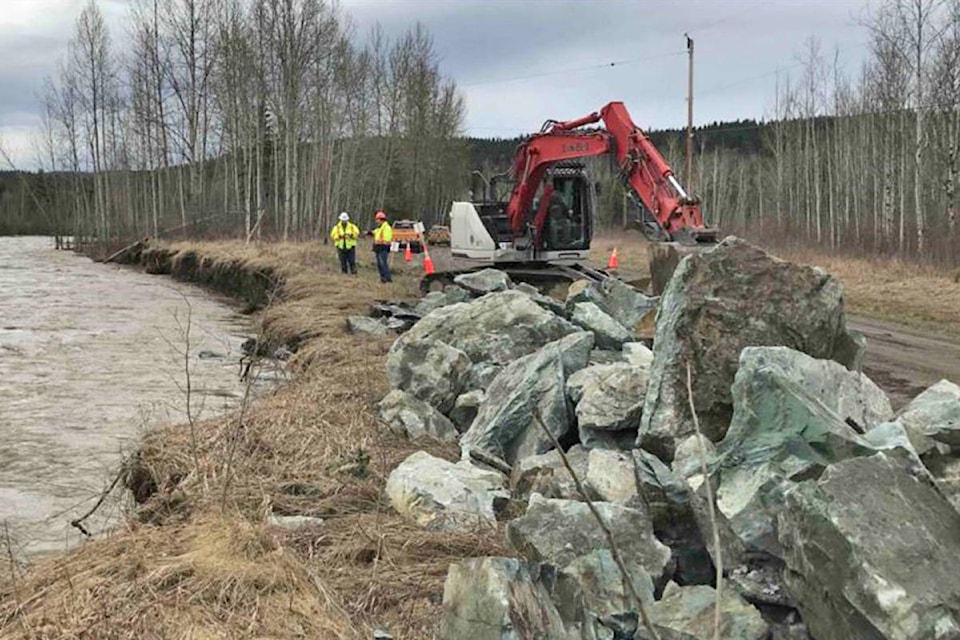 Rip rap being installed on the Quesnel Hixon Road, one of more than 90 sites impacted by spring freshet in the Cariboo Chilcotin. (Ministry of Transportation and Infrastructure photo)