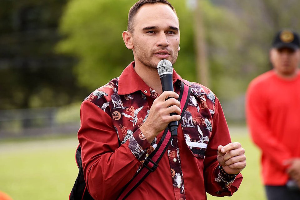 Williams Lake First Nations Chief Willie Sellars leads the May 28 ceremony. (Angie Mindus photo - Williams Lake Tribune)