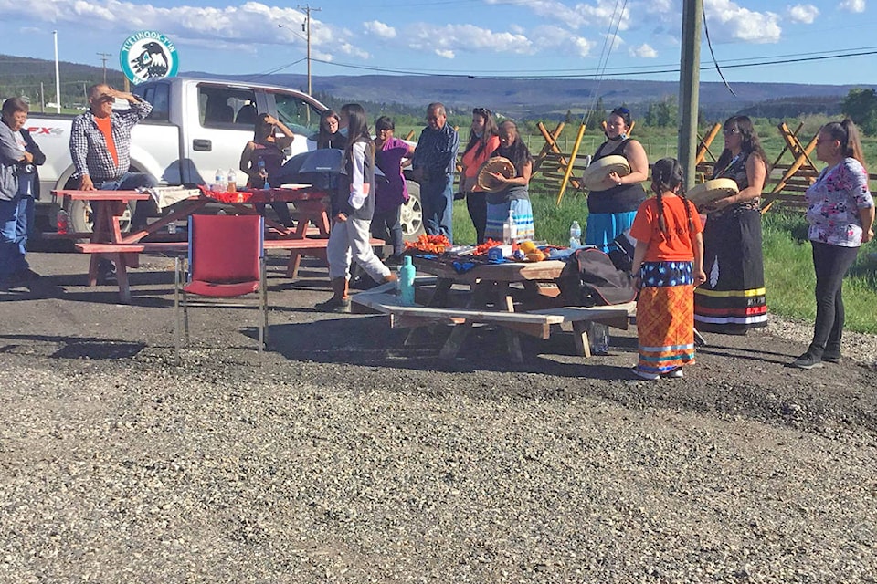 Tl’etinqox community members gather for a ceremony in memory of the 215 children buried at the former site of the Kamloops Residential School. (Facebook photo)