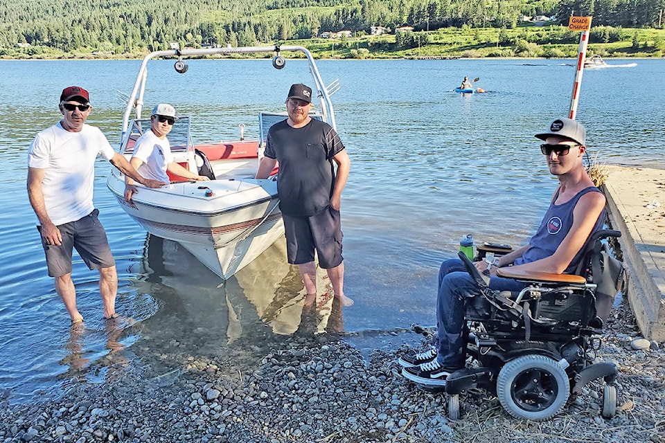 Brayden Methot (right) along with his father Brad Methot, left, and friends Brandon Lilico and Dylan Sinclair at the Scout Island boat launch would like to see better access to Williams Lake. (Monica Lamb-Yorski photo - Williams Lake Tribune)