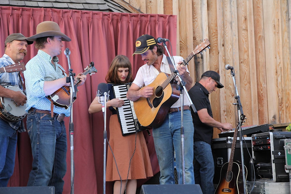 Blue Wranglers: Bruce Amber, back left, Dam Fremlin, Dustin Bentall and Trixie Berkel. Arlen Park, right. (Kelly Sinoski photo - 100 Mile Free Press)