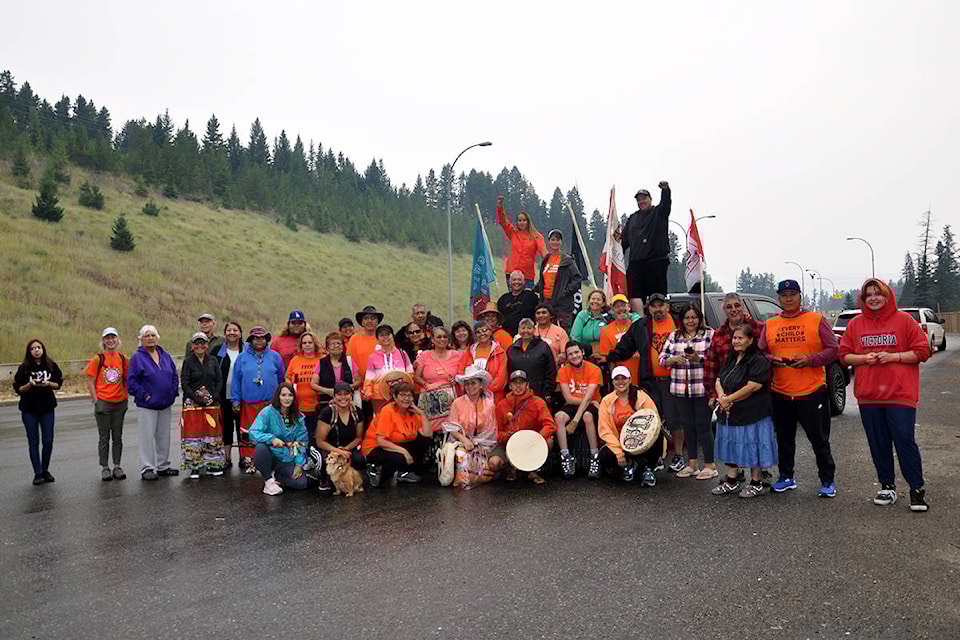 The group participating in the Warrior Walk for Healing from the Yukon to Kamloops meets at the brake check north of Williams Lake on Highway 97 just before departing for the Tourism Discovery Centre. (Greg Sabatino photo - Efteen)