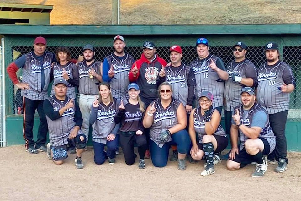 The Rowdies celebrate their Late Summer Madness slo-pitch tournament victory after knocking off the Tomahawks of Kamloops in the championship Sunday night, Aug. 22. (Photo submitted)
