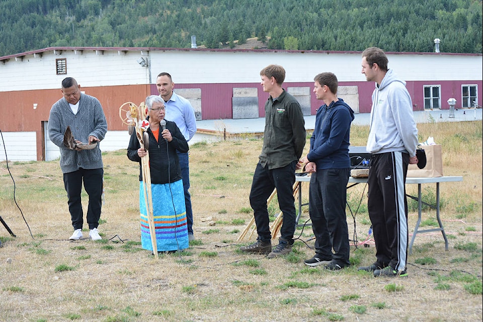 Charlene Belleau, former chief of Esk’etemc and former chair of First Nations Health Council, and present First Nations liaison with the Ministry of Indigenous Relations and Reconciliation, addresses GeoScan’s Will Meredith, Peter Takacs and Adam Czecholinski during a ceremony at the former St. Joseph’s Mission Indian Residential School site where GeoScan will be doing ground penetrating radar analysis of the grounds. (Monica Lamb-Yorski photo - Williams Lake Tribune)