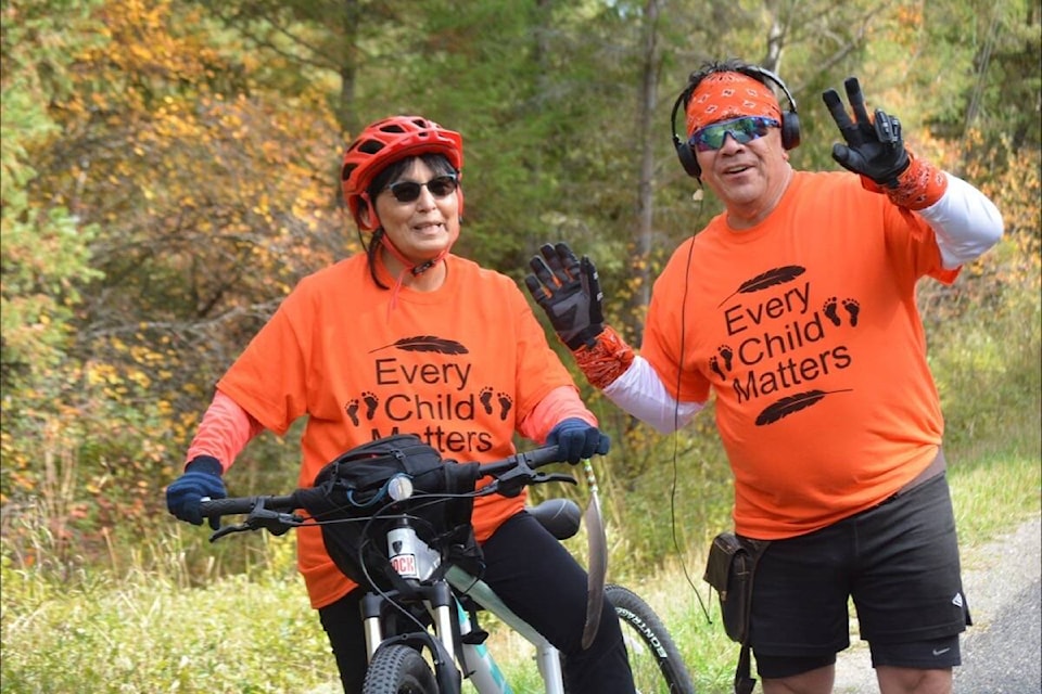 Jackie and James Mattice ride and run in memory of Marge Wycotte and children of the past, present and future. (Monica Lamb-Yorski photo - Williams Lake Tribune)