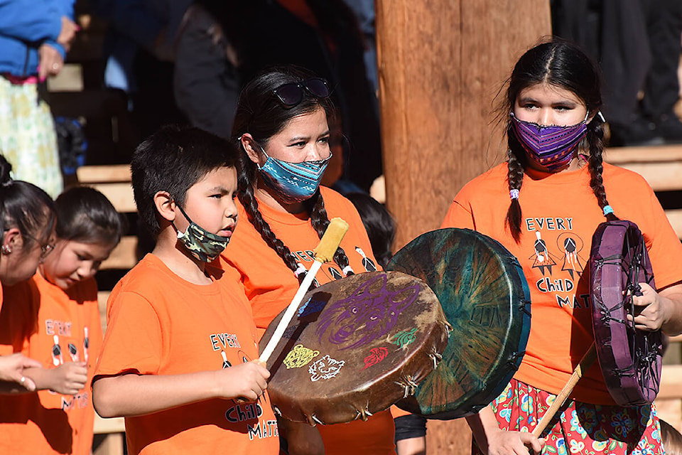 Children helped to form a drum circle in the arbor at WLFN where an event was held to acknowledge Canada’s first National Day for Truth and Reconciliation Sept. 30, 2021. (Angie Mindus photo - Williams Lake Tribune)
