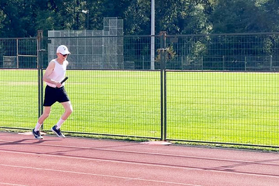 Williams Lake’s Pat Harton runs the third leg during the men’s 75-79 4x800 metre relay race at the BC Masters Track and Field Championships held Aug. 8 in Surrey. (Photo submitted)