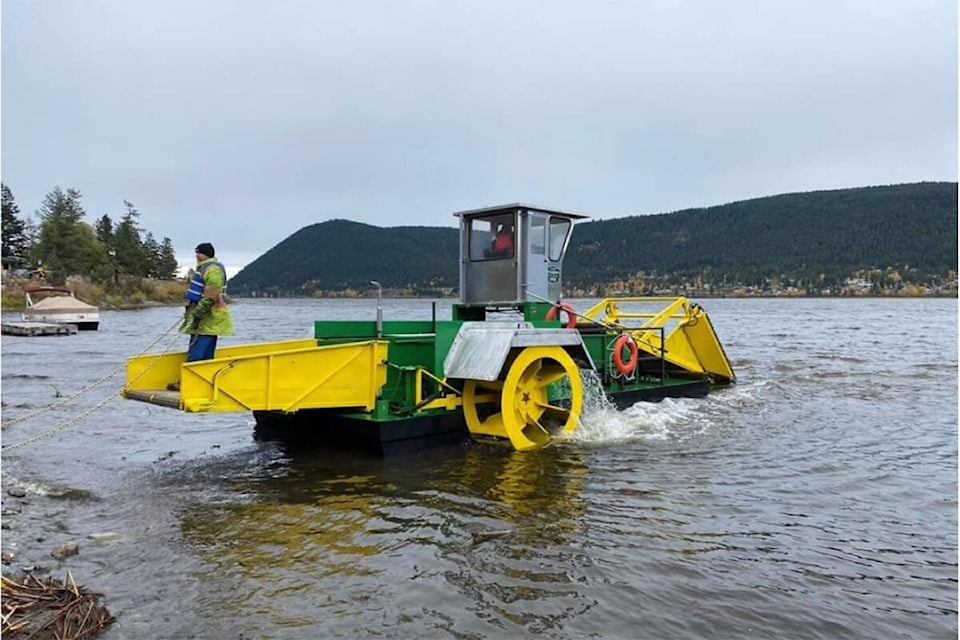 The city’s weed harvester in action on Williams Lake Tuesday, Oct. 12. (Scott Nelson photo)