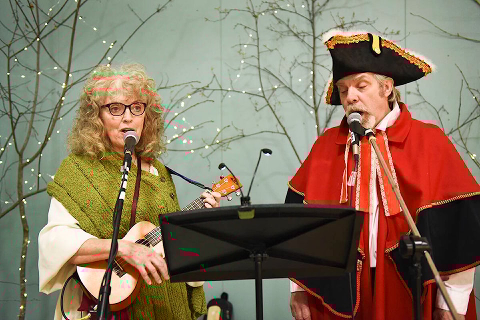 Sharon Hoffman (left) and Harry Jennings helped to entertain the customers and vendors at the Medieval Market on Saturday, Nov. 20. (Ruth Lloyd Photo - Efteen)