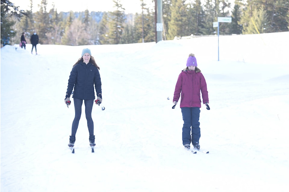 Kristy Fornwald and her daughter Ana Burkey, 10, get out on the trails at Bull Mountain. “We spend a lot of time up here,” said Fornwald. “It feels like our second home in the winter.” (Ruth Lloyd photo - Efteen)