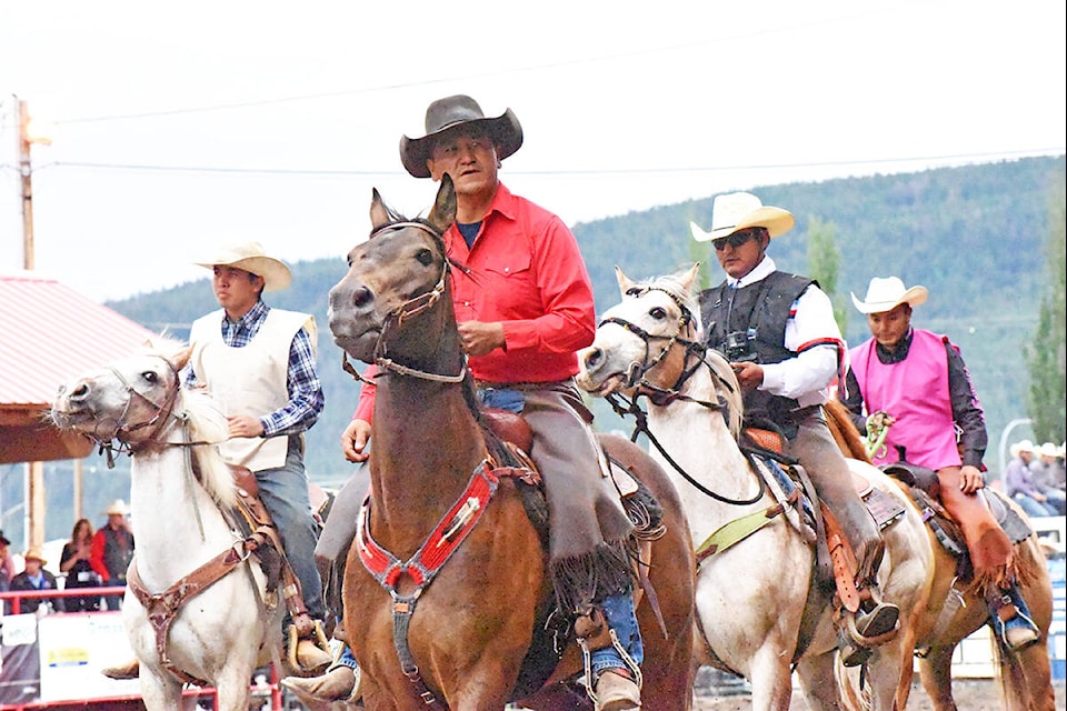 Xeni Gwet’in rider Howard Lulua (front) is introduced along with other competitors in the 2019 Saturday Mountain Race at the Williams Lake Stampede. (Angie Mindus photo - Williams Lake Tribune)