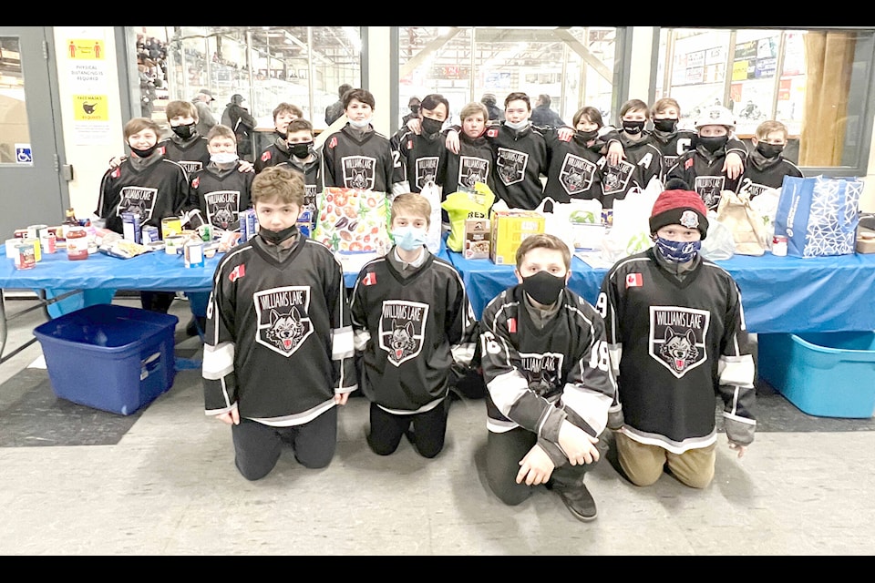 Williams Lake’s U13 Timberwolves collected donations of food and cash for the local food bank at the Williams Lake Stampeders game Saturday night, Feb. 12. (Angie Mindus photo - Williams Lake Tribune) Williams Lake’s U13 Timberwolves collect donations of food and cash for the local food bank at the Williams Lake Stampeders game Saturday night. (Angie Mindus photo - Williams Lake Tribune)