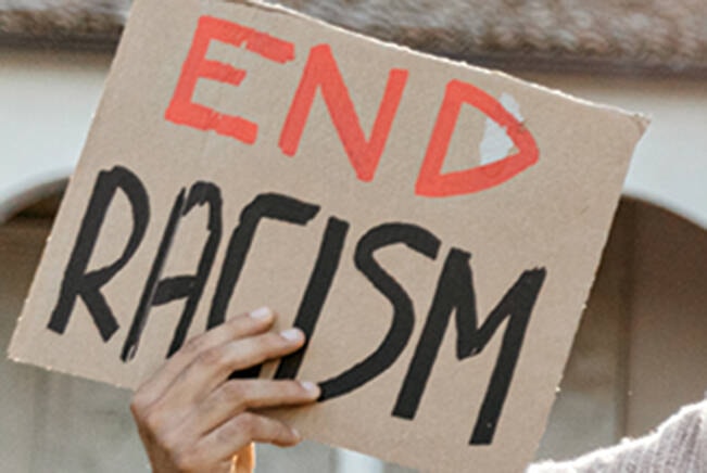 27926148_web1_2106390-NBU-anti-racism-car-rally-1_1