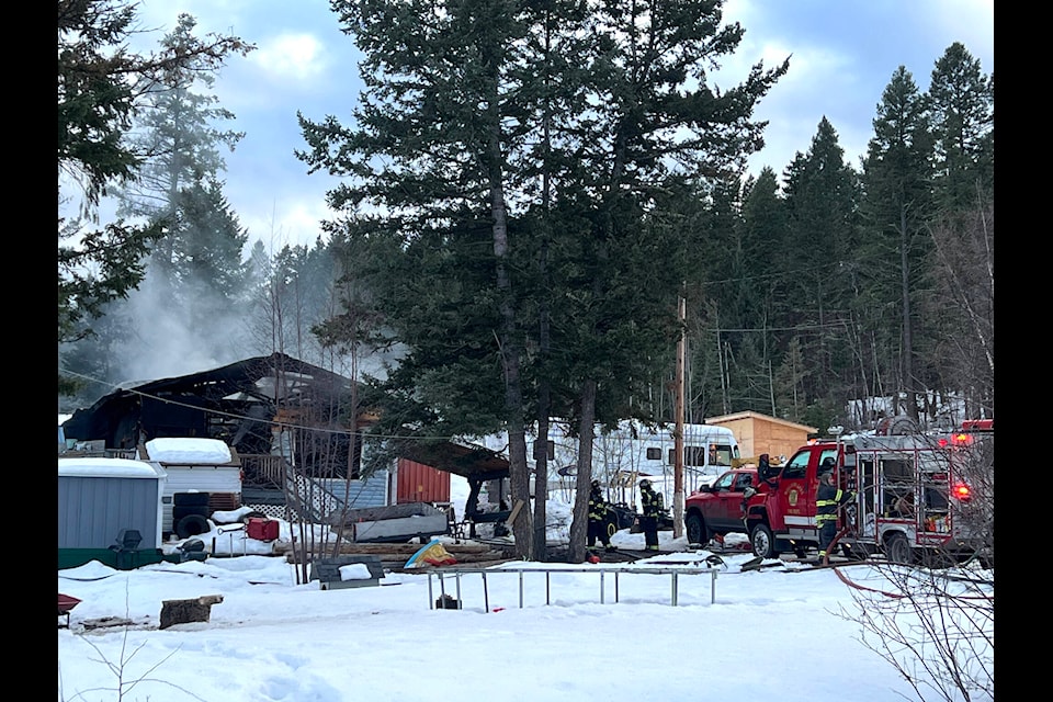 Firefighters battled a house fire Friday afternoon (March 4).(Angie Mindus photo - Williams Lake Tribune)
