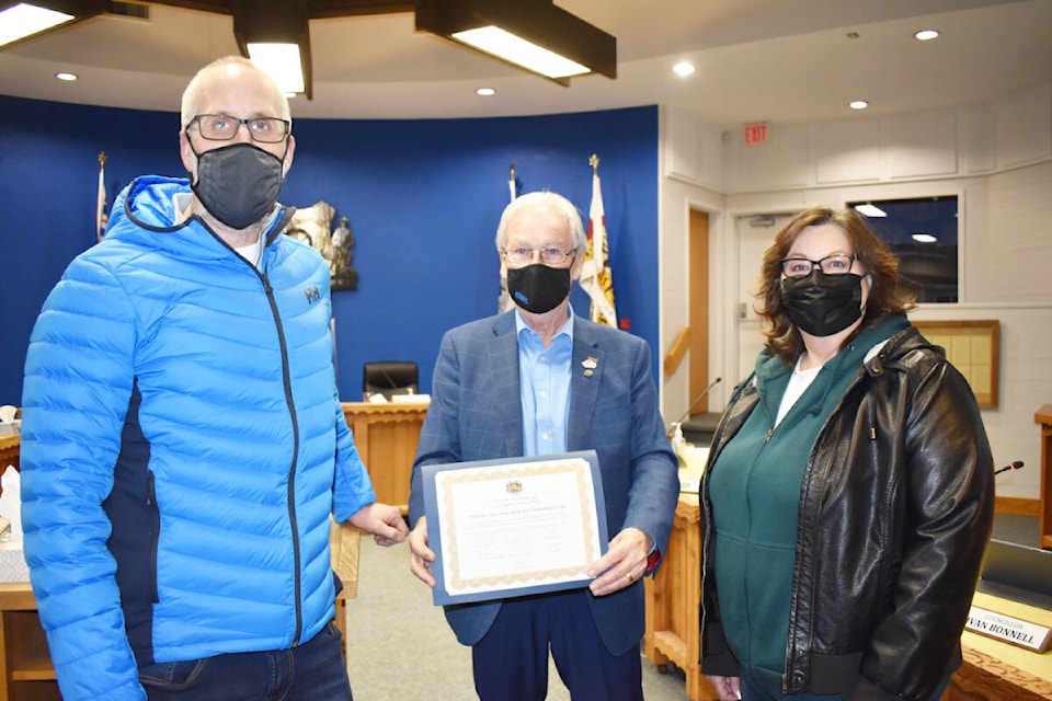 Building owner Stefan Hoelzer, left, and Tammy Fischer, Williams Lake Community Living Association program coordinator accept the city’s accessibility award of merit from Mayor Walt Cobb. (Monica Lamb-Yorski photo - Efteen)