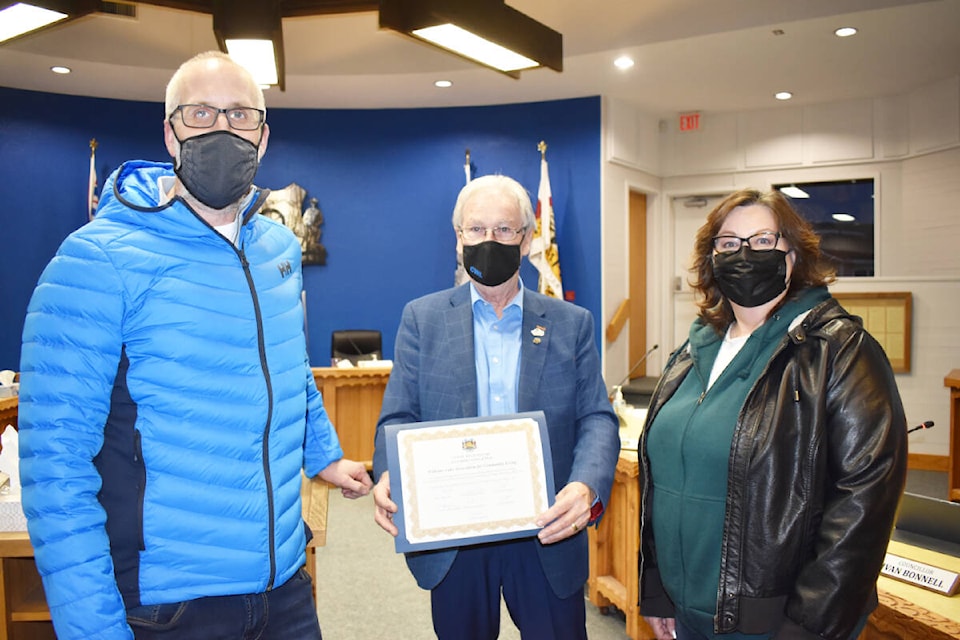 Building owner Stefan Hoelzer, left, and Tammy Fischer, Williams Lake Community Living Association program coordinator accept the city’s accessibility award of merit from Mayor Walt Cobb. (Monica Lamb-Yorski photo - Williams Lake Tribune)