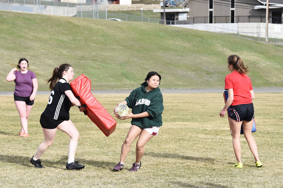 28700289_web1_220414-WLT-RugbyGirls_2