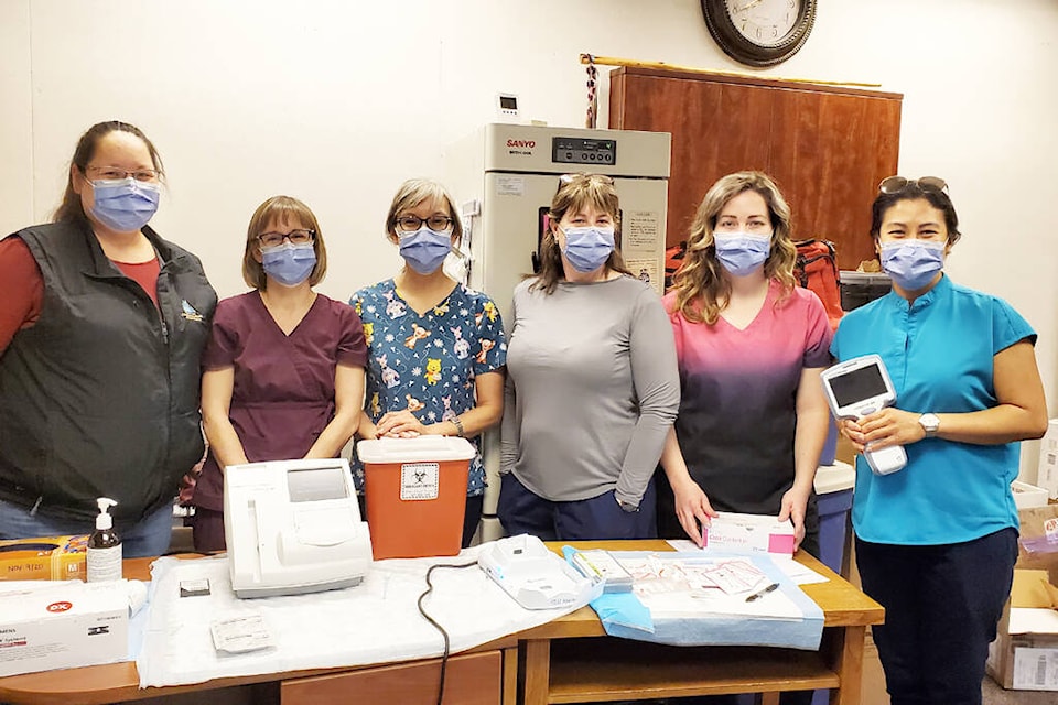 Nurses Stacey Isaac, from left, Elizabeth Stadnyk, Sheila Mack, Sandra Palombi, Kayla Smith complete their training for Kidney Check screening with Grace Oloresisimo, the trainer. (Monica Lamb-Yorski photo - Williams Lake Tribune)