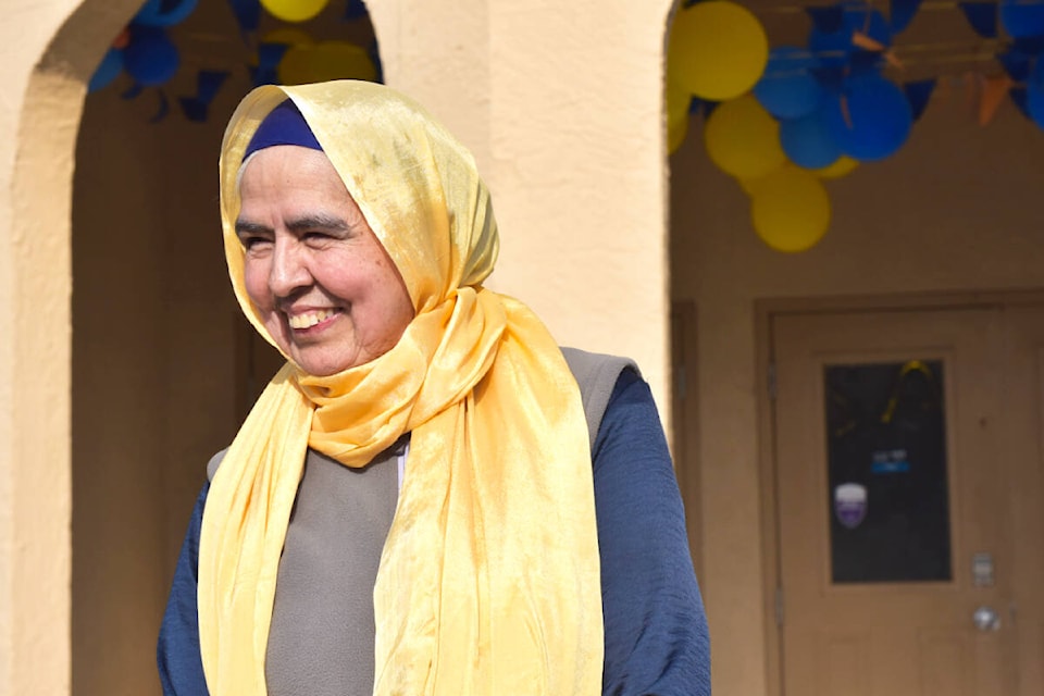 Rajinder Kaur Johal is all smiles celebrating Vaisakhi Day Saturday, April 23. (Angie Mindus photo - Efteen)