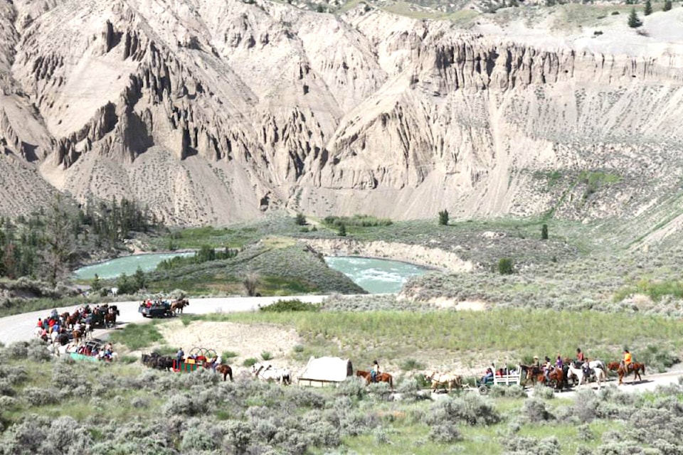 The Xeni Gwet’in Youth Wagon Trip makes its way through Farwell Canyon during a previous trip. The annual wagon and horse ride is back on this year for the 13th trip following a two-year hiatus due to the pandemic. (Gailene William photo)
