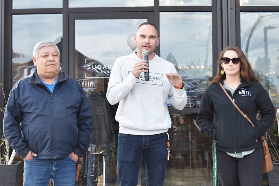 Williams Lake First Nation councillor Chris Wycotte, left, Chief Willie Sellars and councillor Shae Chelsea outside WLFN’s new farm-to-gate cannabis facility during its grand opening Friday, May 6. (Monica Lamb-Yorski photo- Efteen)