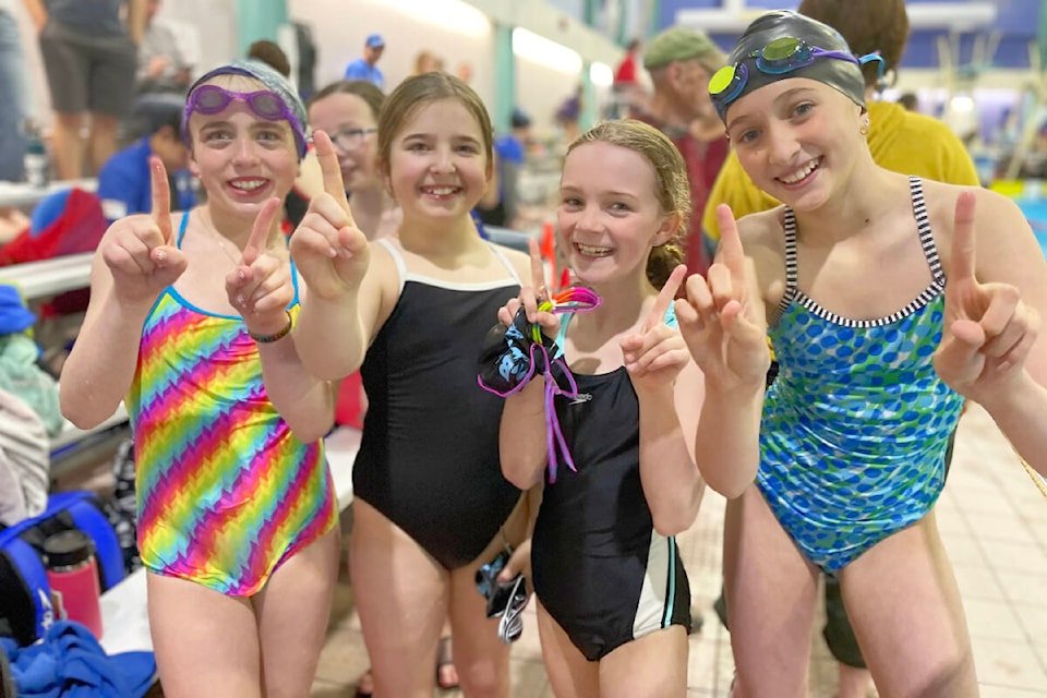 Blue Fins swimmers Emmeline Theriault, from left, Noemi Baumann, Lilly Reedman, and Eleanor Dean. (Victoria Dean photo)