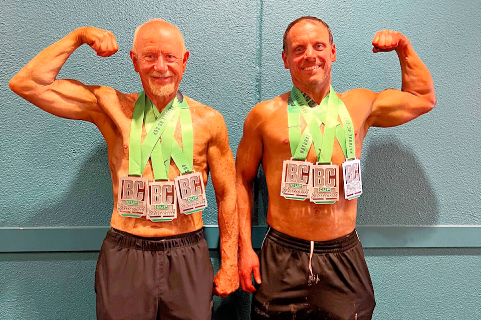 Al Campsall, on left, and Larry Fitzpatrick, show their physiques and their medals after a competition in Kamloops. (Photo submitted)