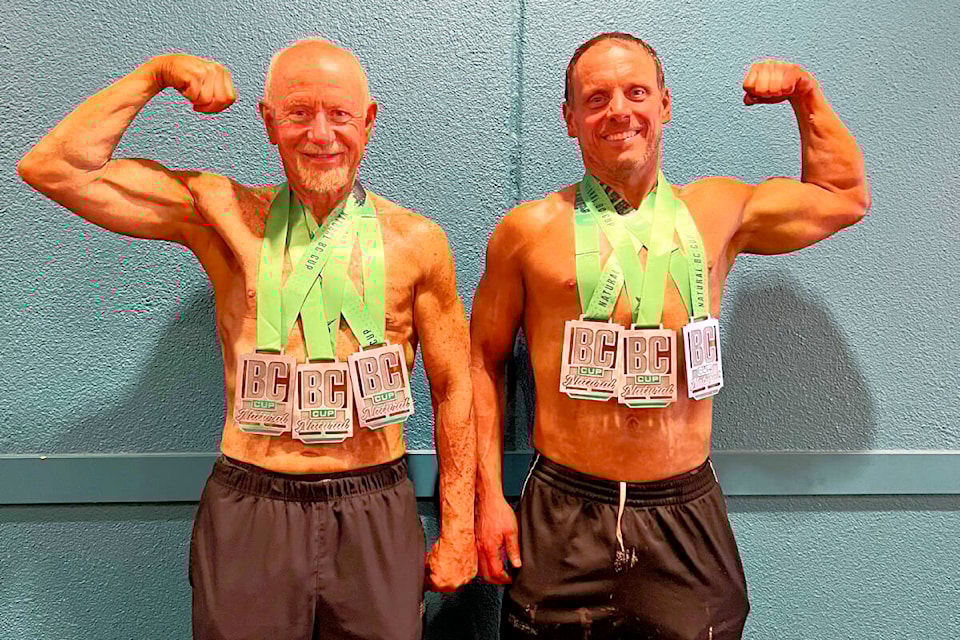Al Campsall, on left, and Larry Fitzpatrick, show their physiques and their medals after a competition in Kamloops. (Photo submitted)
