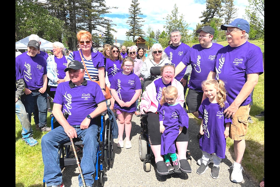 Bob McAllister (front left) and Adrienne Kelso and their families lead the Walk for the Cure in Boitanio Park Saturday, June 5. (Angie Mindus photo - Williams Lake Tribune)