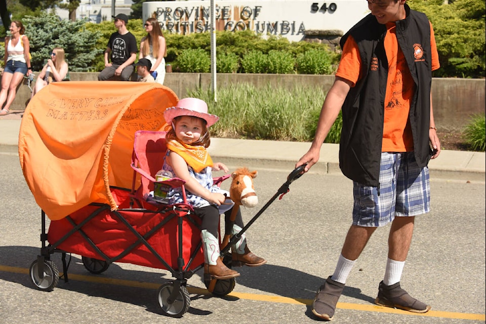 Tiny tots and wee wagons were part of the return of the Williams Lake Stampede Parade on a sunny Saturday morning. (Ruth Lloyd photo - Williams Lake Tribune)