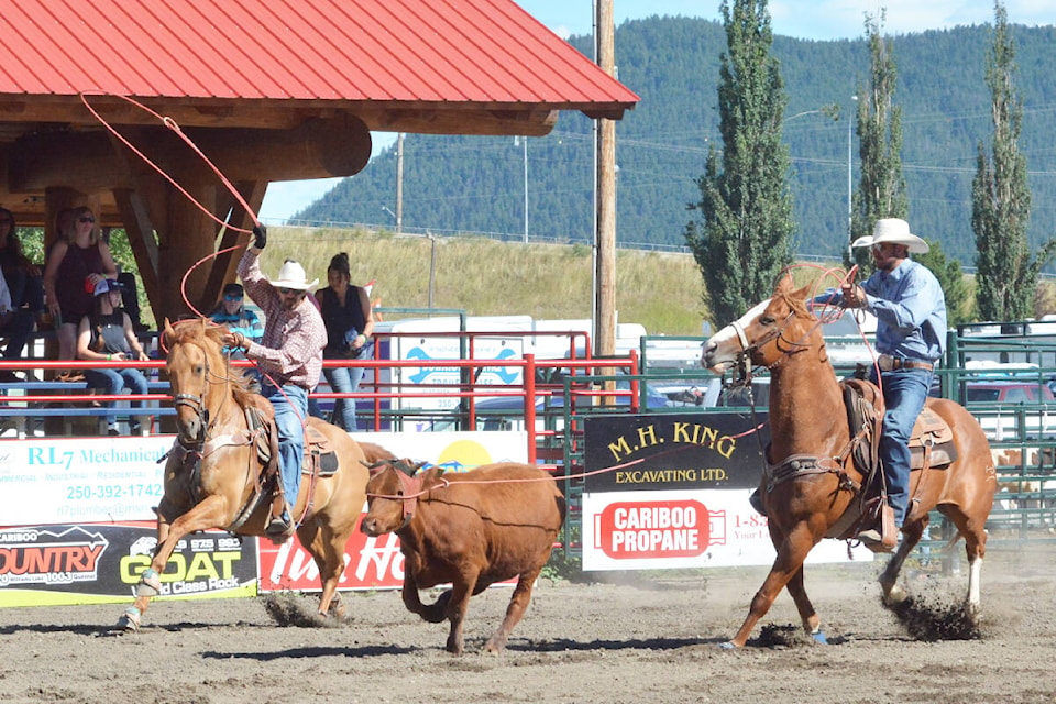 Chad Braaten and Cody Braaten of 150 Mile House compete in team roping Sunday, Aug. 14 at the Williams Lake Outdoor Rodeo. (Monica Lamb-Yorski photo - Williams Lake Tribune)